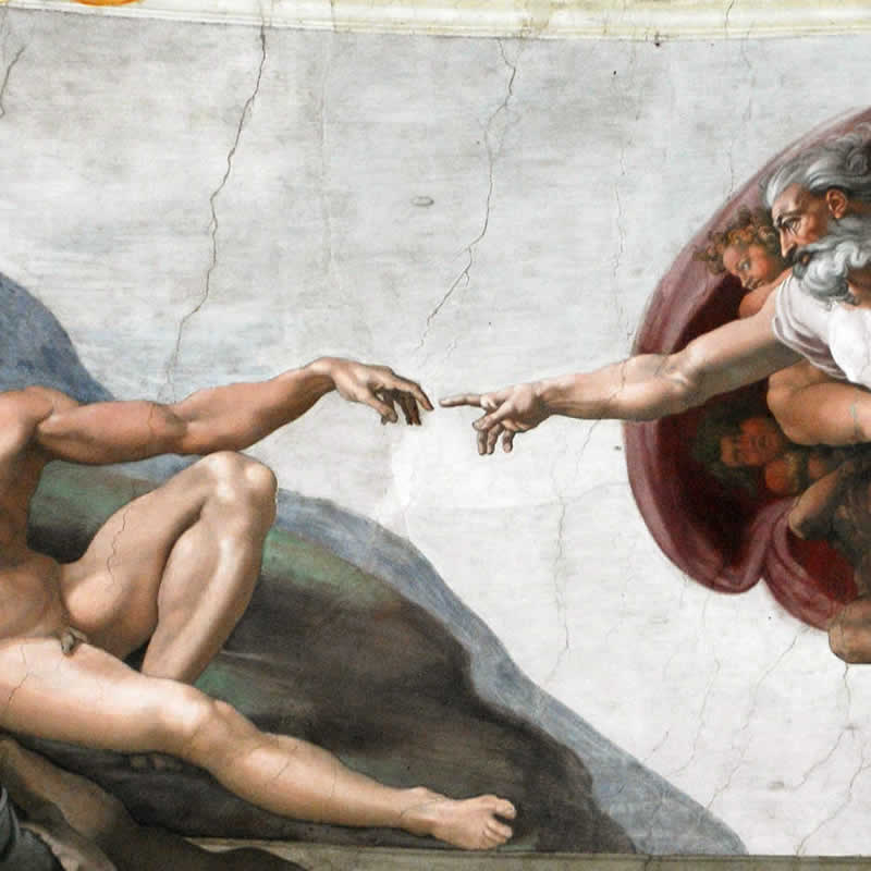 Detalle de la Creación de Adán con frescos de Miguel Ángel en la Capilla Sixtina